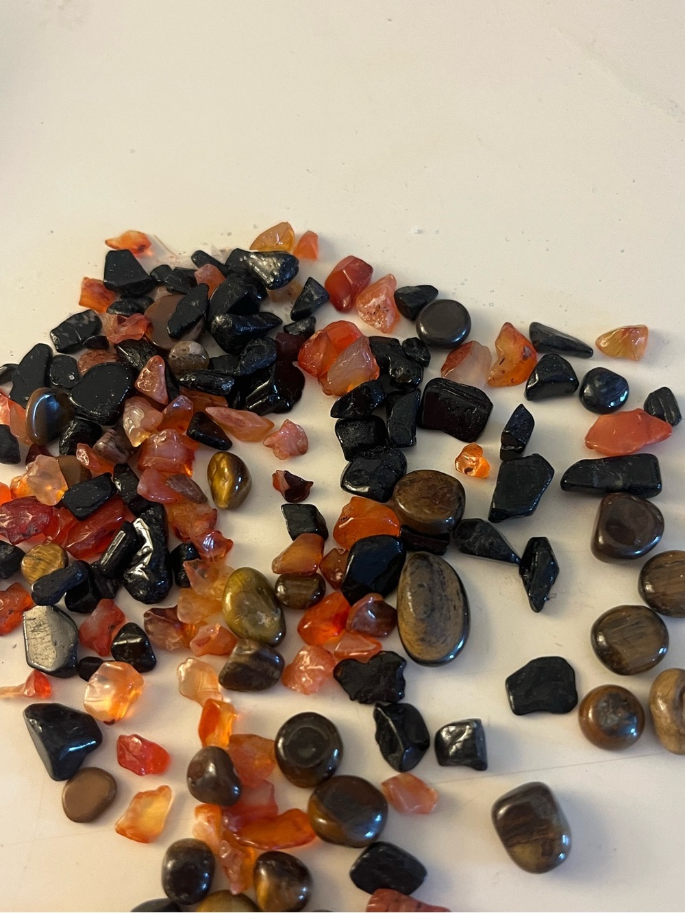Black tourmaline, tigers, eye, calcite chips
